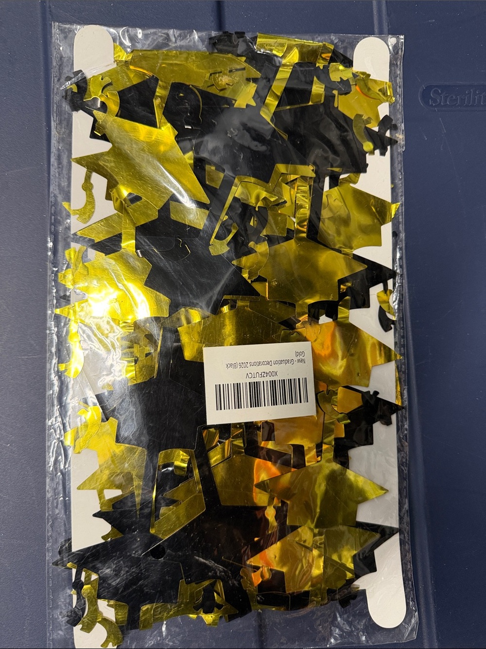 Graduation Cap Confetti Party Decorations - Gold and Black grad streamer hanging